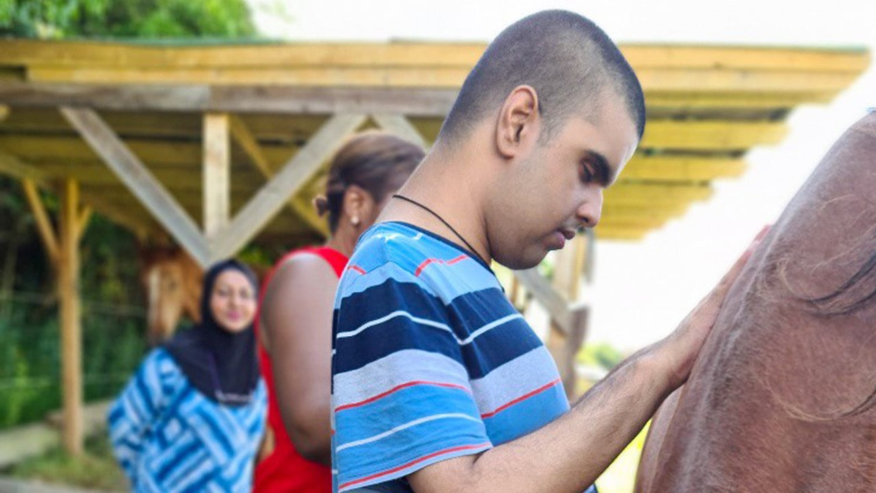 Parent and child meeting with a Tuition Extra tutor